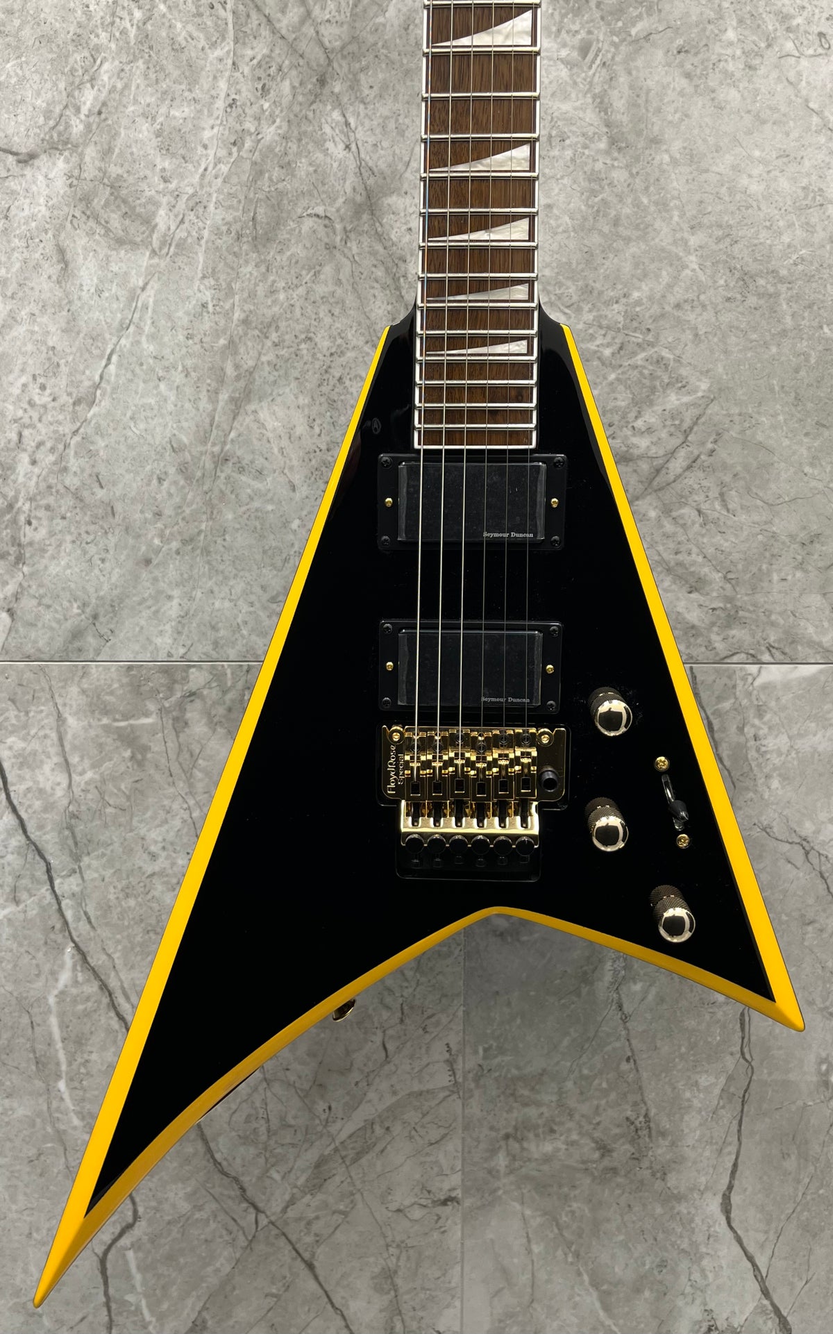 Jackson X Series Rhoads RRX24 Black with Yellow Bevels