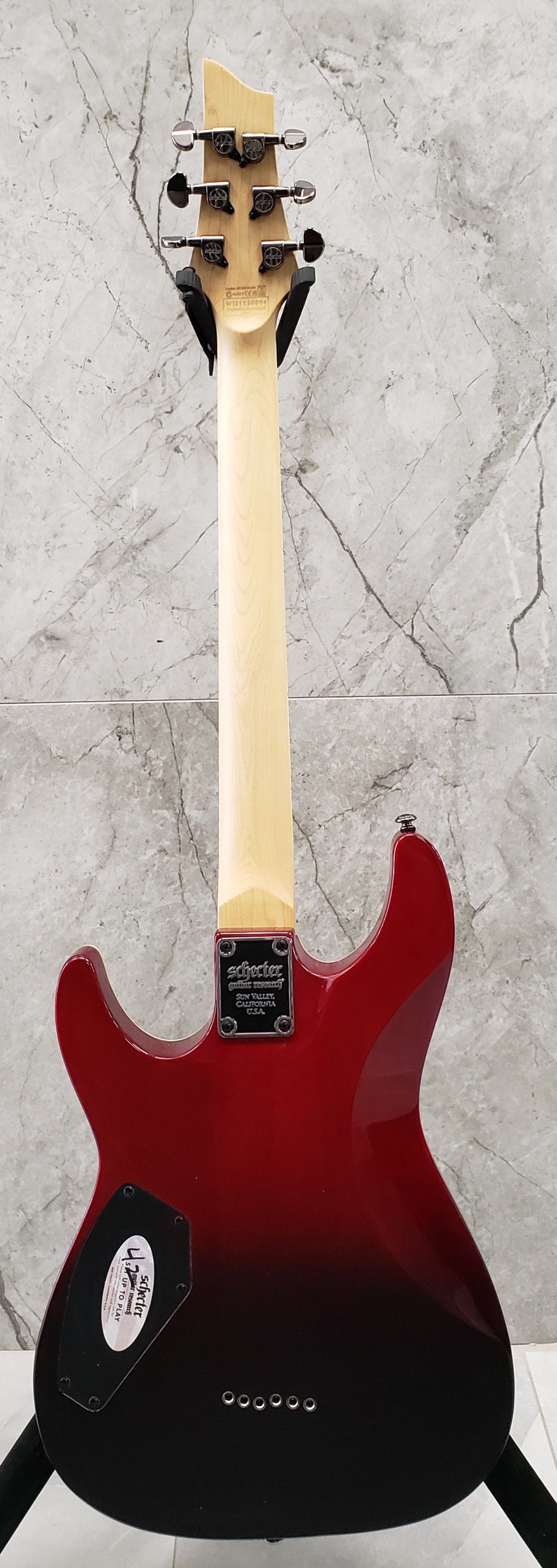 Schecter Omen Extreme 6 String in Blood Burst 2034-SHC